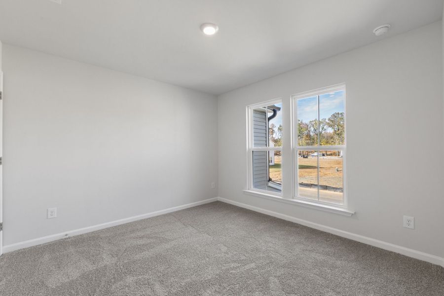 Spacious, unfurnished interior of a new home in Poets Walk, Whitsett (Image 20).