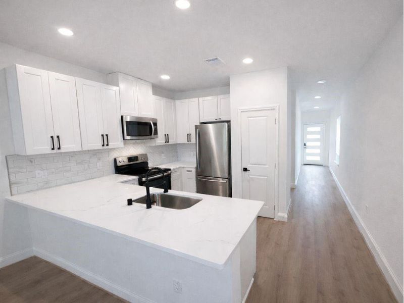 Furnished interior view inside a new home in Hill & Dale Ranch, Splendora (Image 5). Furnished interior view inside a new home in Hill & Dale Ranch, Splendora (Image 5).