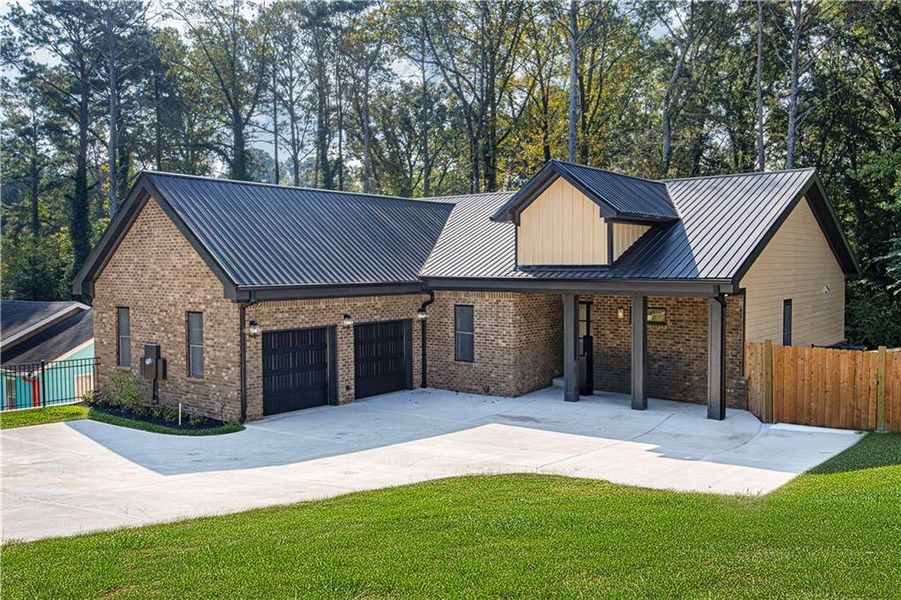 Front exterior of a new home in , Forest Park, GA, highlighting curb appeal (Image 26). Front exterior of a new home in , Forest Park, GA, highlighting curb appeal (Image 26).