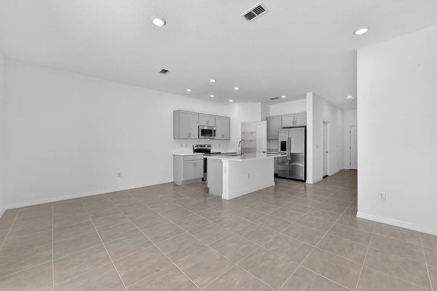 Furnished interior view inside a new home in Firethorn, Parrish (Image 6).