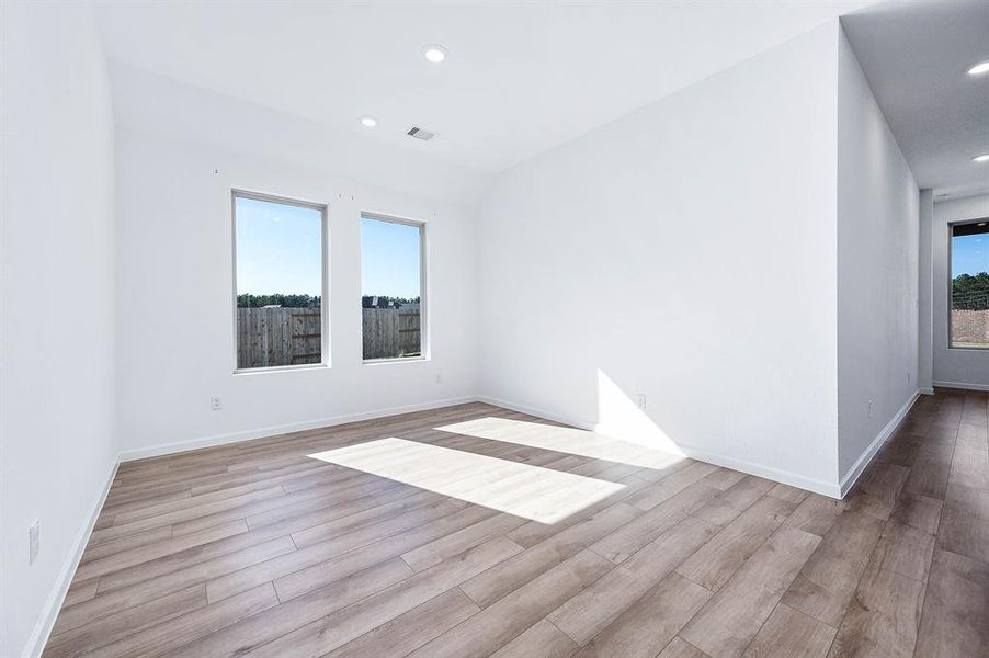 Flooded with natural light, this spacious dining room is perfect for all your family meals.