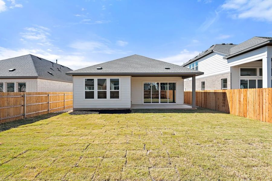 Exterior details and patio area of a home in Arbor Collection at Heritage, Dripping Springs (Image 28).