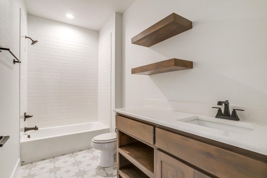 Representative furnished interior of a home built from the Pecan Grove by Trinity Classic Homes in The Reserve at Shadle, Poolville (Image 12). Representative furnished interior of a home built from the Pecan Grove by Trinity Classic Homes in The Reserve at Shadle, Poolville (Image 12).