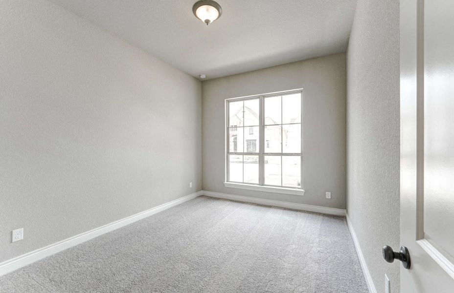 Representative unfurnished interior of a home built from the 3799 by Ravenna Homes in Artavia 70′, Conroe (Image 47).