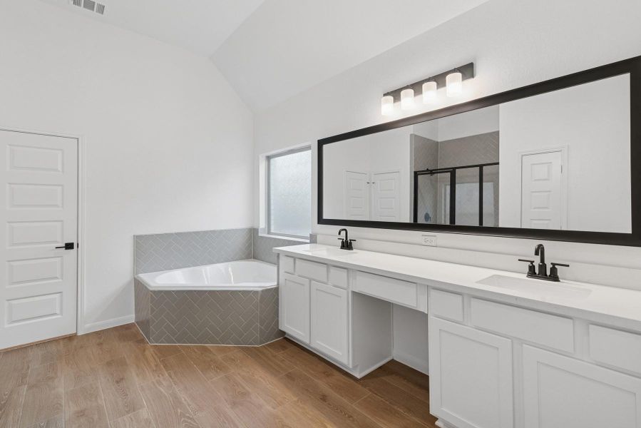 Relaxing owner's bath (*Photo not of actual home and used for illustration purposes only.)