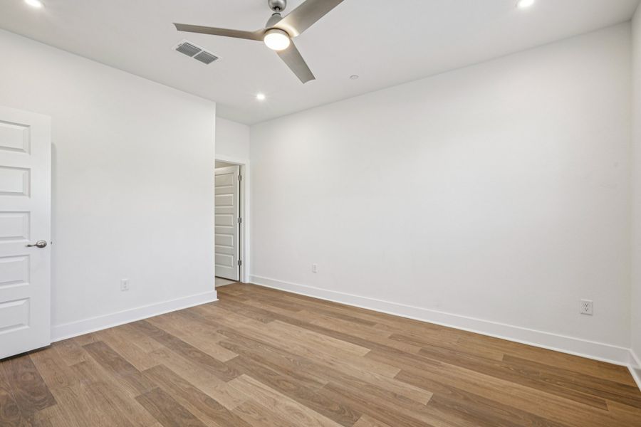 Spacious, unfurnished interior of a new home in Koenig Townhomes, Austin (Image 22).
