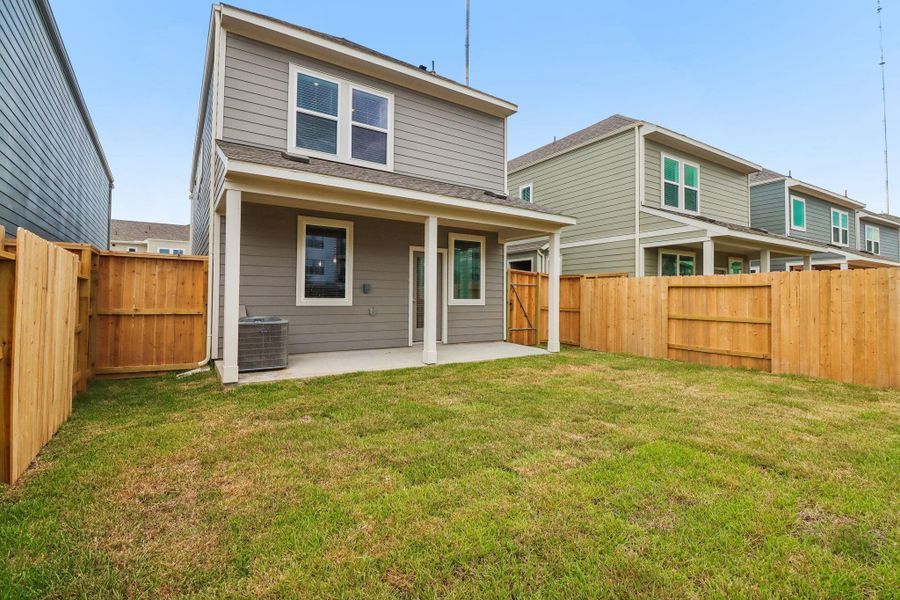 Exterior details and patio area of a home in Parkway Commons - City Series, Missouri City (Image 3).