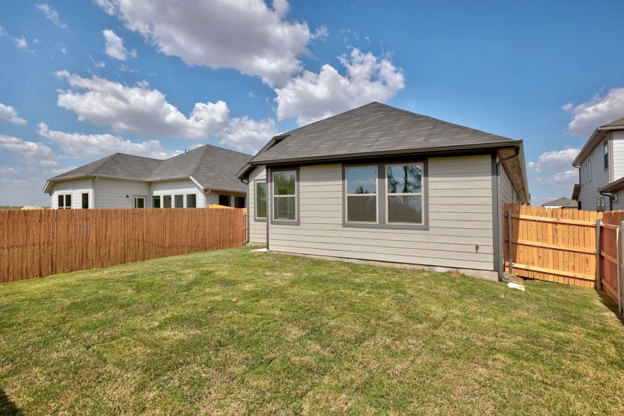 Exterior details and patio area of a home in Trinity Ranch, Elgin (Image 22).