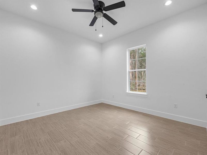 Bedroom, with great lighting and a ceiling fan.