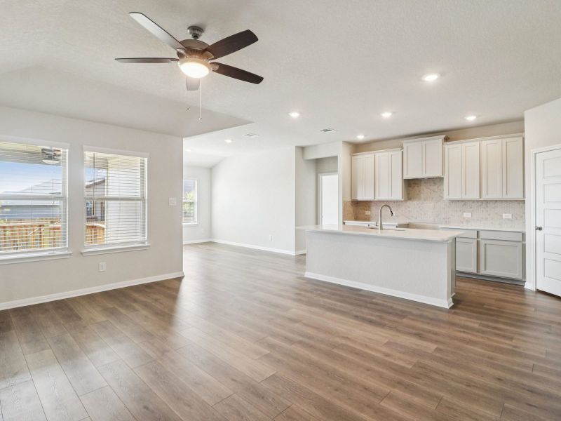 Living and kitchen in the Callaghan floorplan at a Meritage Homes community.