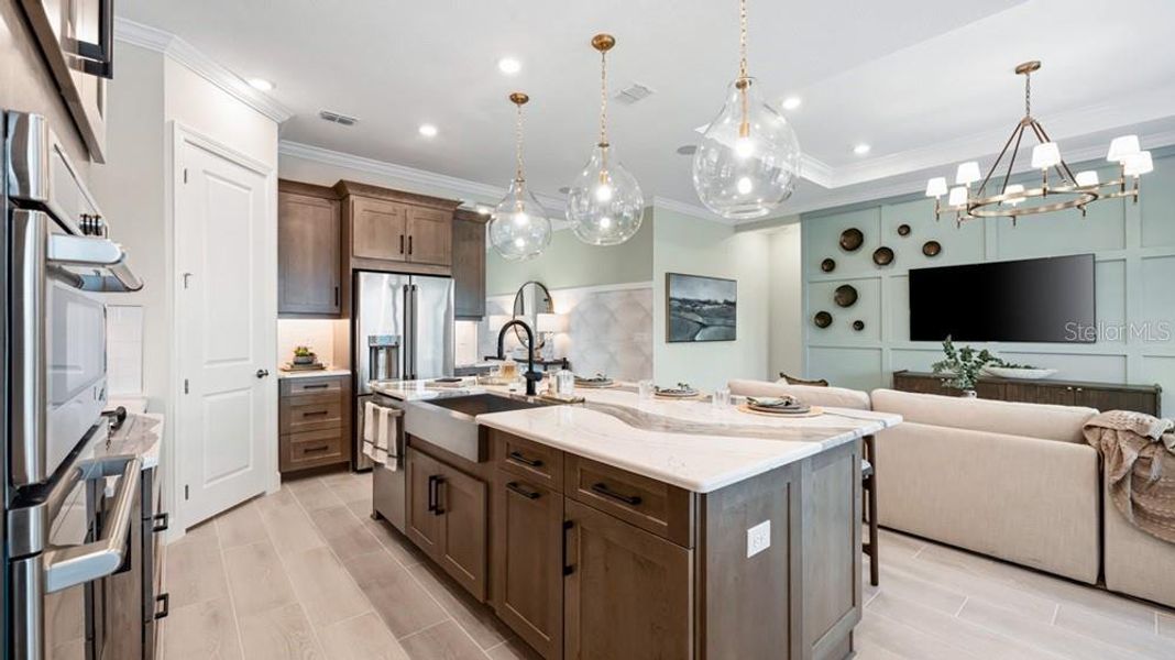 Furnished interior view inside a new home in Esplanade at Wellen Park, Englewood (Image 15).