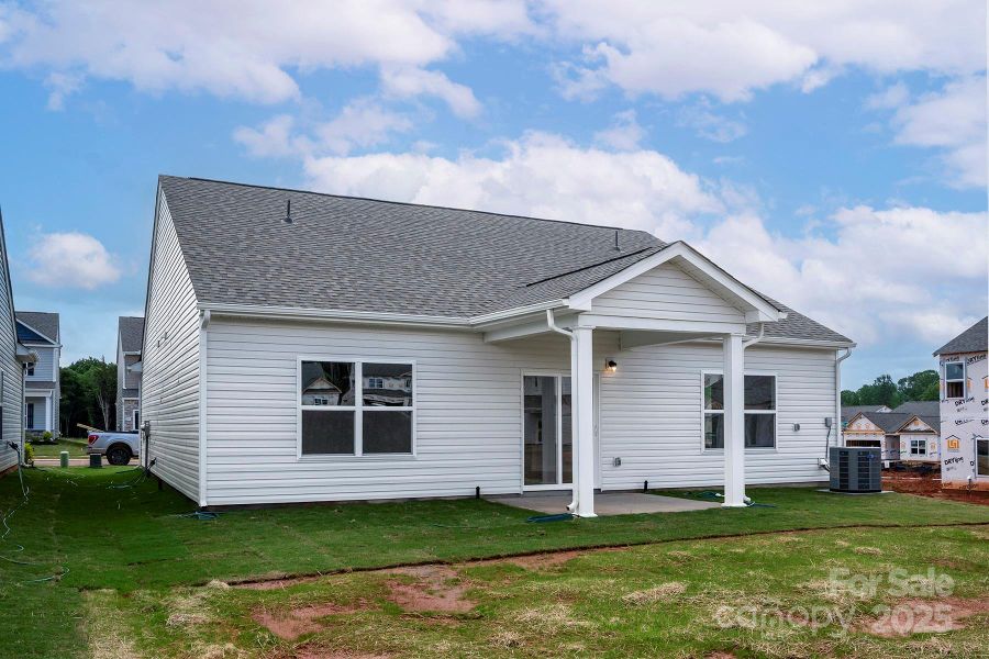 Front exterior of a new home in Ascot Woods, Charlotte, NC, highlighting curb appeal (Image 2).