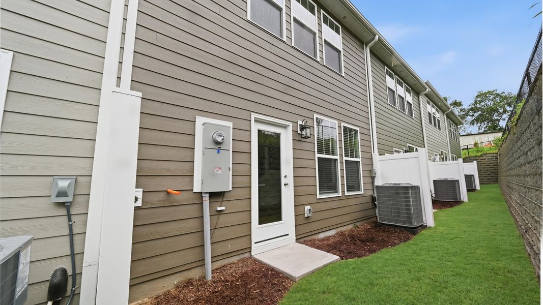 Exterior details and patio area of a home in Clayton Crossing, Arden (Image 4).