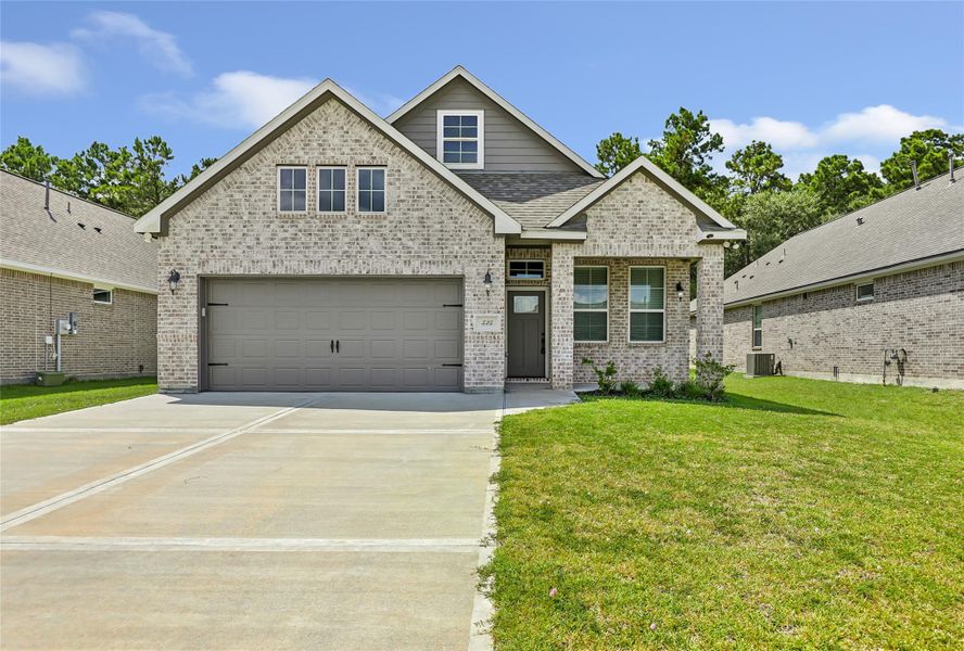 Front exterior of a new home in , Anahuac, TX, highlighting curb appeal (Image 24).