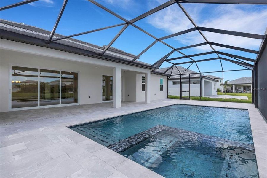 Exterior details and patio area of a home in Cassata Lakes, Nokomis (Image 4).