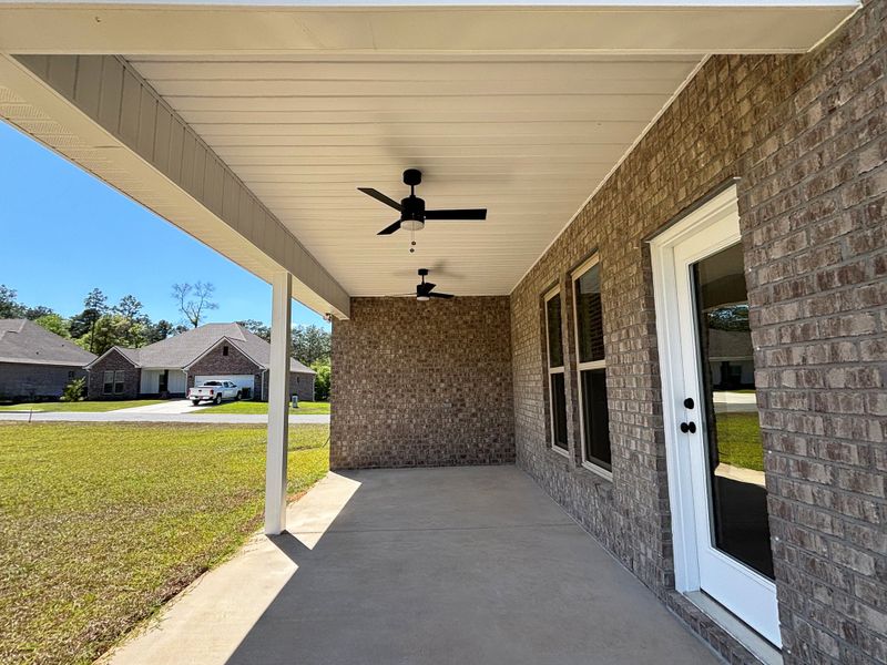 Exterior details and patio area of a home in Young Oaks, Crestview (Image 3).