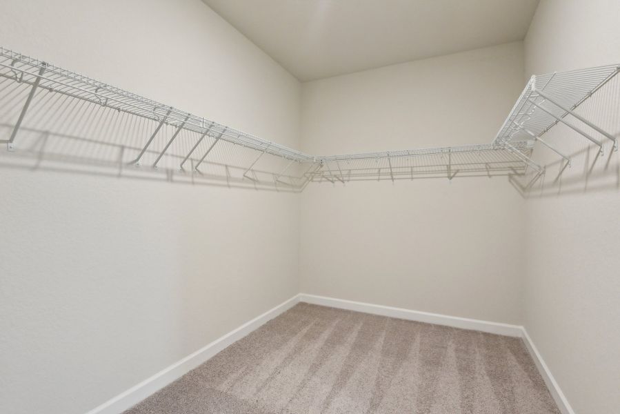 Representative unfurnished interior of a home built from the Makenzie by Ashton Woods in Hennersby Hollow, San Antonio (Image 25).
