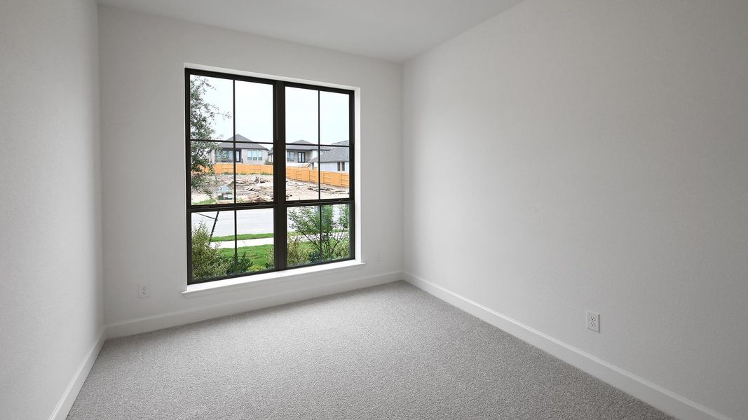 Spacious, unfurnished interior of a new home in 6 Creeks, Kyle (Image 8).