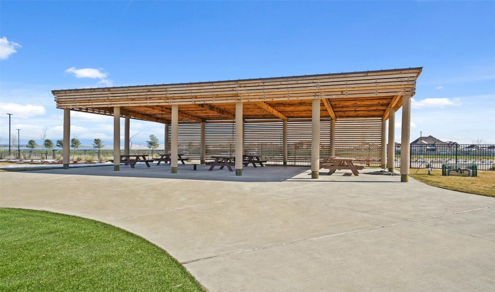 Spacious covered pavilion with picnic tables.