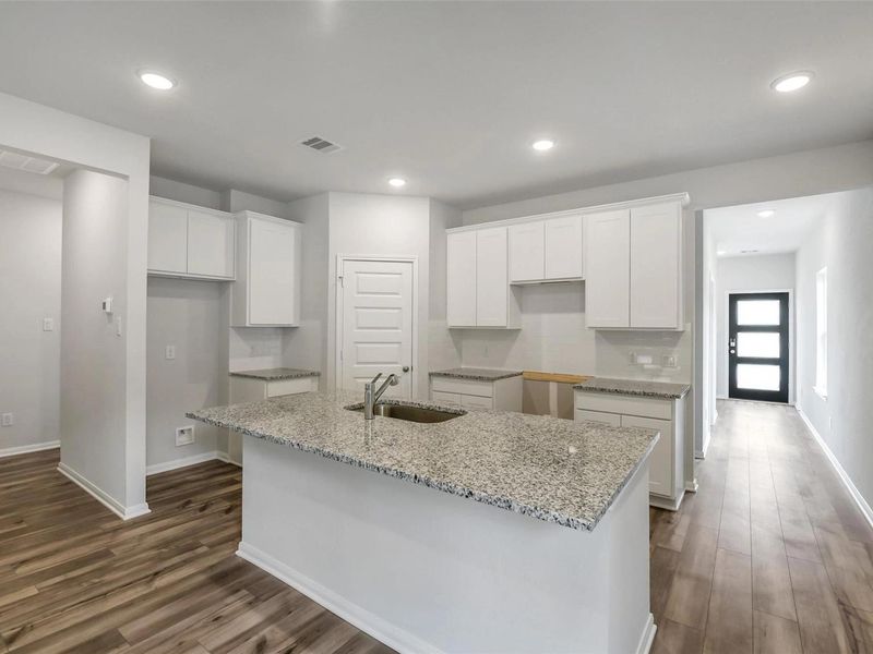 Furnished interior view inside a new home in Caney Creek Place, Conroe (Image 8).