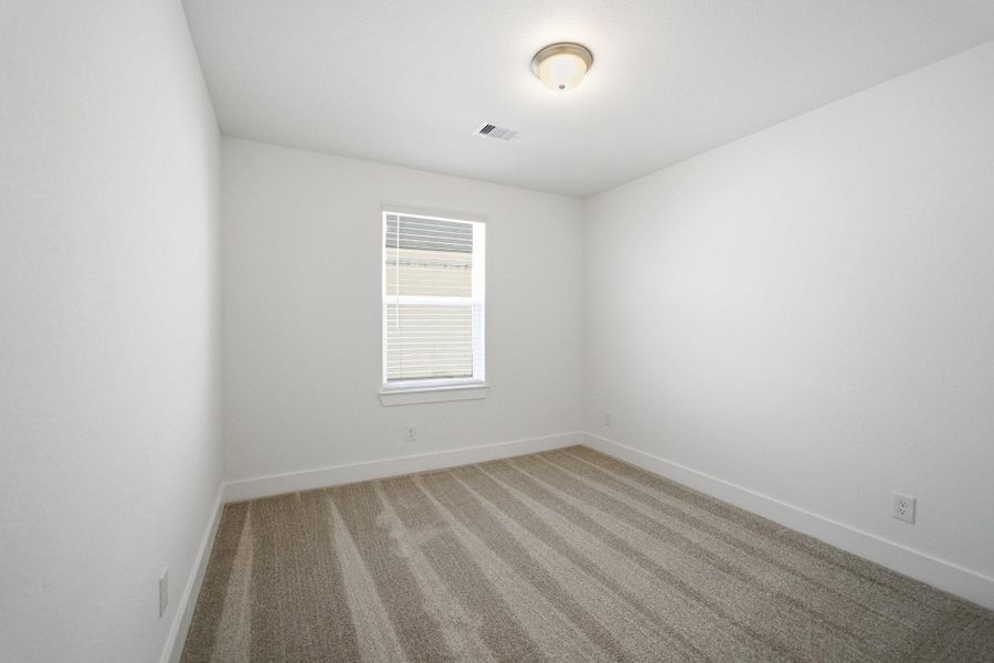 Spacious, unfurnished interior of a new home in Sunterra Lakes, Brookshire (Image 20).