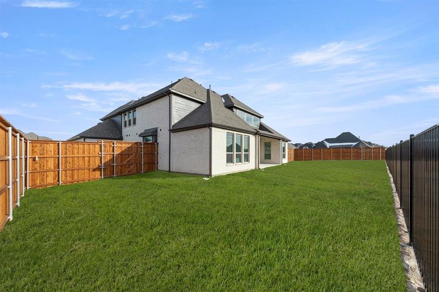 Exterior details and patio area of a home in Cambridge Estates - Harwood, Prosper (Image 3).