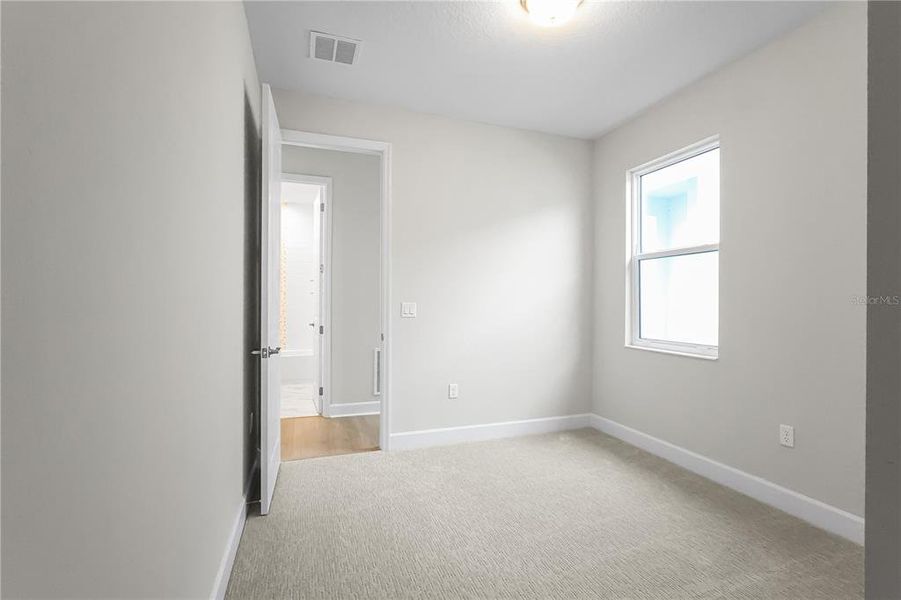 Spacious, unfurnished interior of a new home in Cresswind at Hammock Oaks, Lady Lake (Image 49).