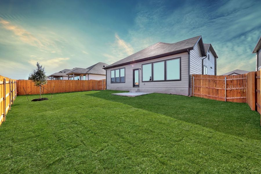 Exterior details and patio area of a home in Prairie Winds, Hutto (Image 4).