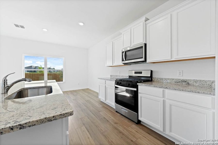 Furnished interior view inside a new home in Savannah Place, San Antonio (Image 5).