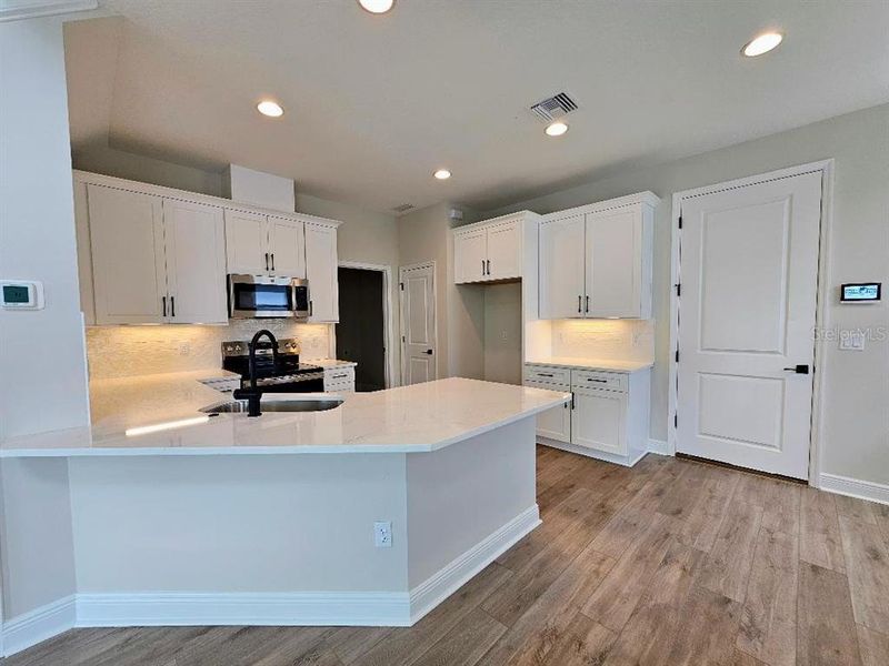 Furnished interior view inside a new home in , Seminole (Image 3).