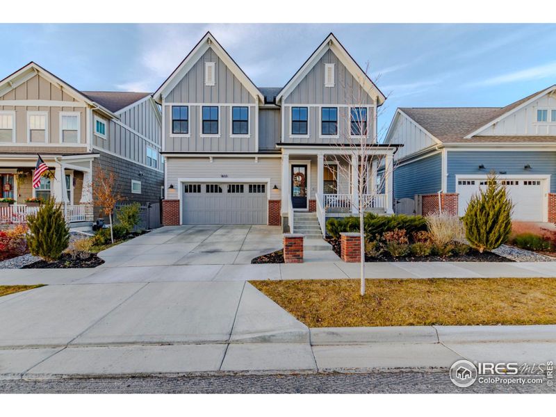 Front exterior of a new home in , Erie, CO, highlighting curb appeal (Image 1). Front exterior of a new home in , Erie, CO, highlighting curb appeal (Image 1).