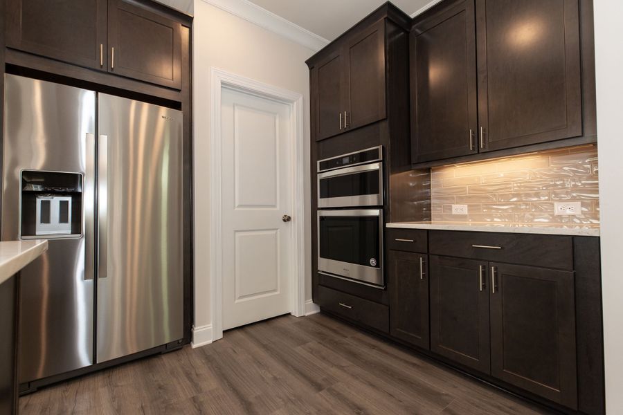 Representative furnished interior of a home built from the The Owens by The Providence Group in Waterhaven, Cumming (Image 12).