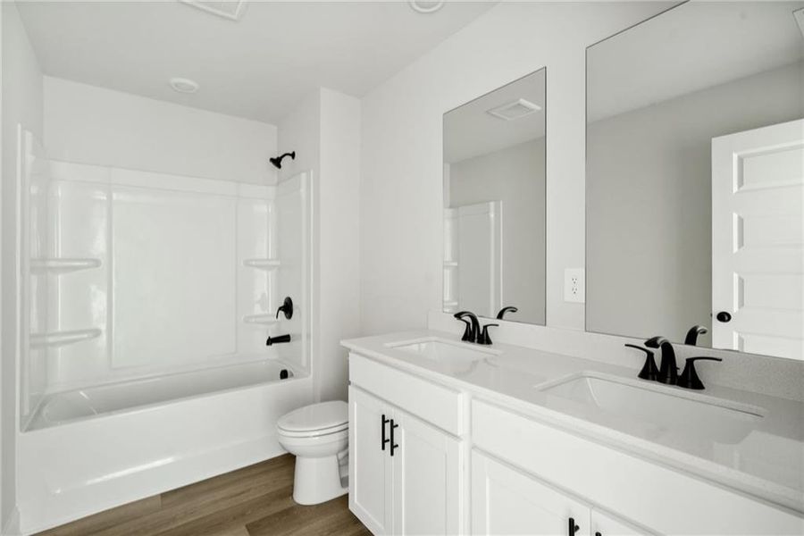 Furnished interior view inside a new home in Martin Springs - Estate Series, Lawrenceville (Image 10).