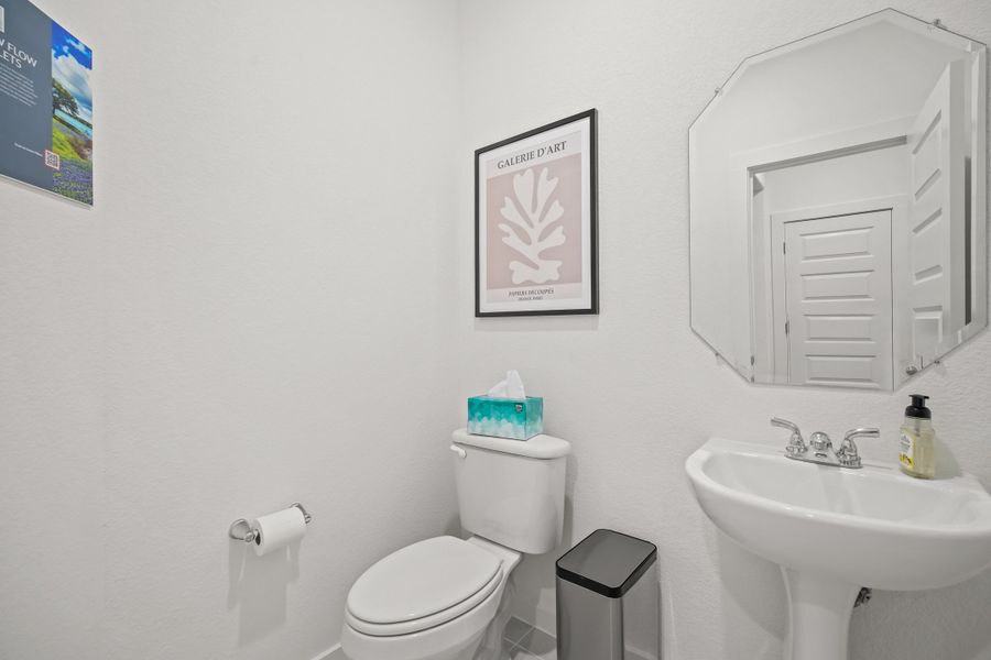 Bathroom in the Oak home plan by Trophy Signature Homes – REPRESENTATIVE PHOTO