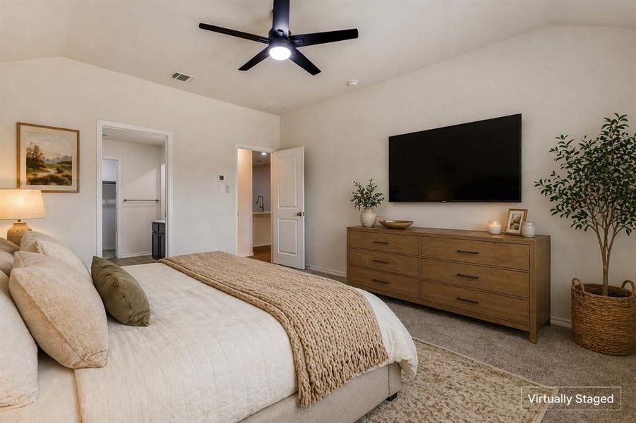 Vaulted ceiling with a black ceiling fan, light neutral wall paint, and gray carpet flooring Vaulted ceiling with a black ceiling fan, light neutral wall paint, and gray carpet flooring