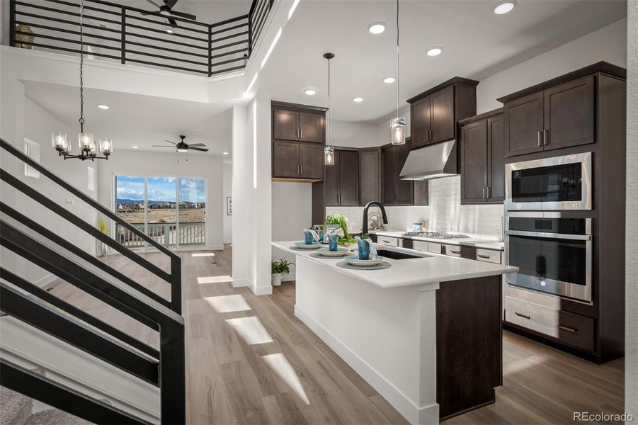 Furnished interior view inside a new home in Revel Crossing at Wolf Ranch - The Panorama Collection, Colorado Springs (Image 6).