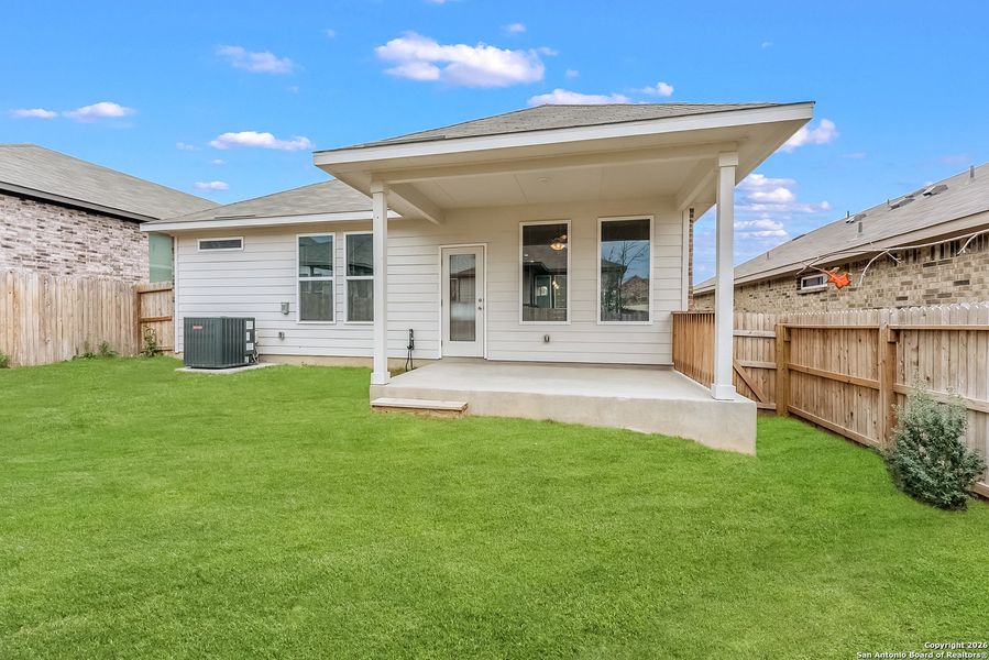 Exterior details and patio area of a home in Bricewood, San Antonio (Image 18).