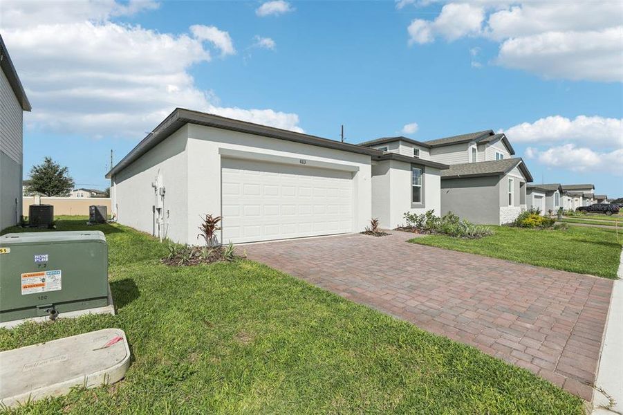 Exterior details and patio area of a home in Lawson Dunes - Signature Series, Haines City (Image 3).