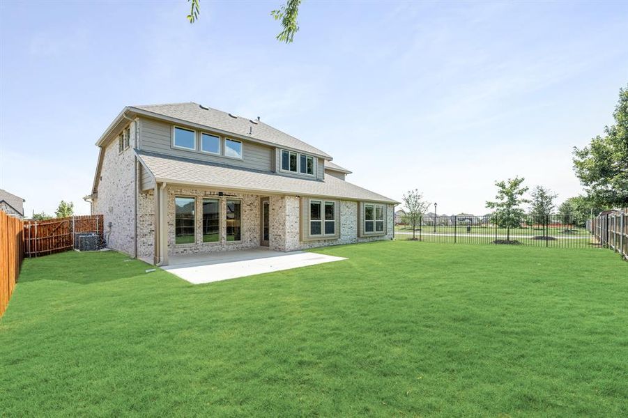 Front exterior of a new home in Mockingbird Heights Classic 60, Midlothian, TX, highlighting curb appeal (Image 26).