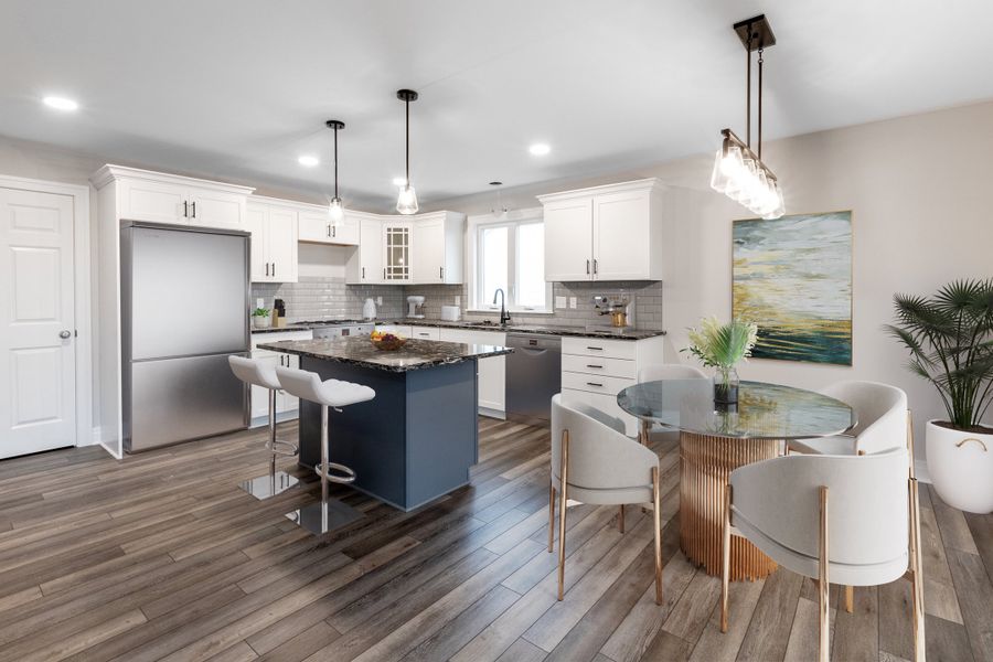 Representative furnished interior of a home built from the The Mallory by Forbes Capretto Homes in Wheatfield Crossing, North Tonawanda (Image 6).