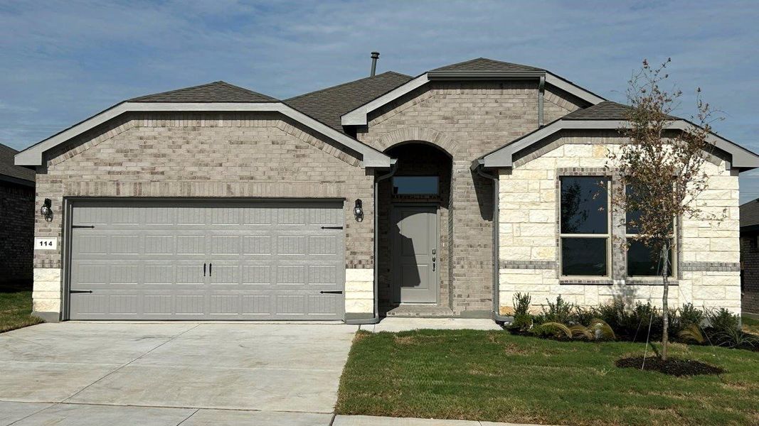 Front exterior of a new home in Bluestem, Rhome, TX, highlighting curb appeal (Image 1). Front exterior of a new home in Bluestem, Rhome, TX, highlighting curb appeal (Image 1).