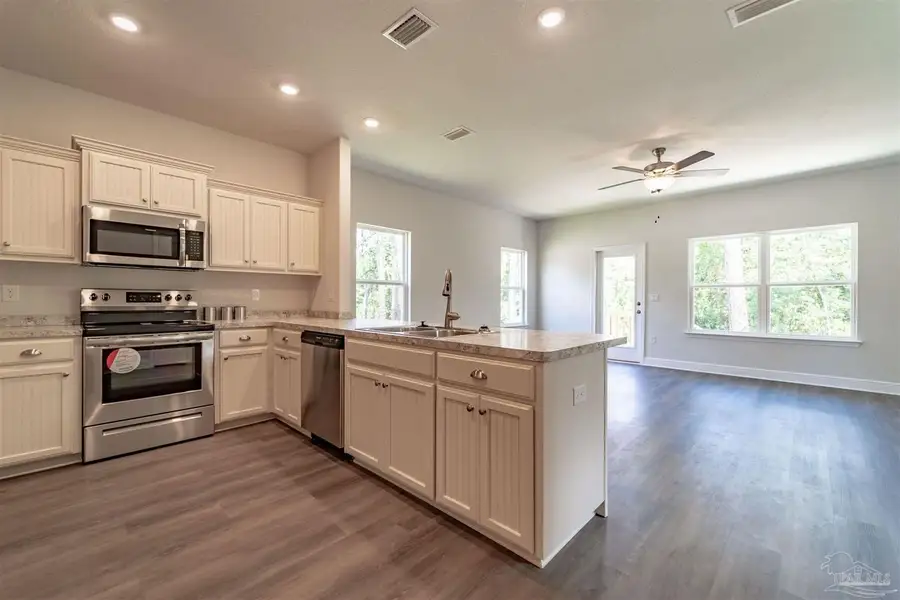 Representative furnished interior of a home built from the 1766 by Adams Homes in East Bay, Panama City (Image 5). Representative furnished interior of a home built from the 1766 by Adams Homes in East Bay, Panama City (Image 5).