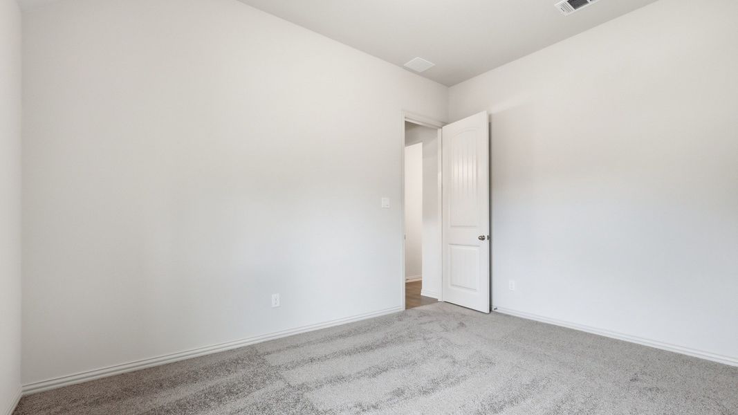 Furnished interior view inside a new home in Thompson Farms, Van Alstyne (Image 18).