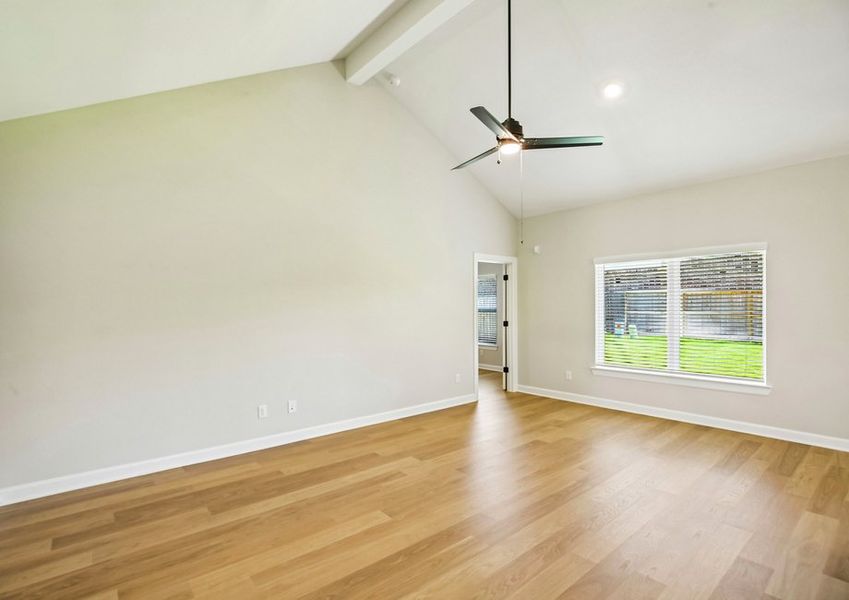 The living room has a soaring ceiling. The living room has a soaring ceiling.