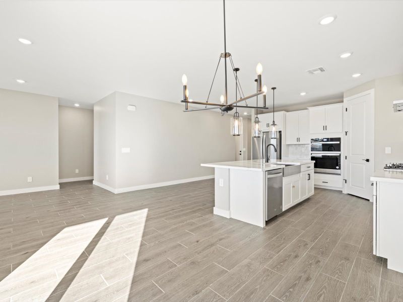 Spacious, unfurnished interior of a new home in White Tank Foothills Reserve Series, Waddell (Image 11).