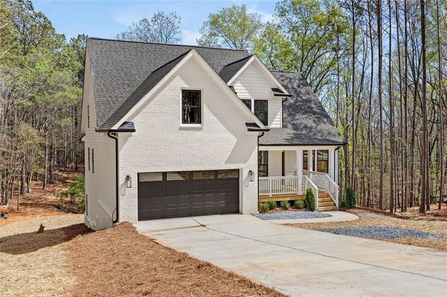 Front exterior of a new home in , Lula, GA, highlighting curb appeal (Image 2). Front exterior of a new home in , Lula, GA, highlighting curb appeal (Image 2).
