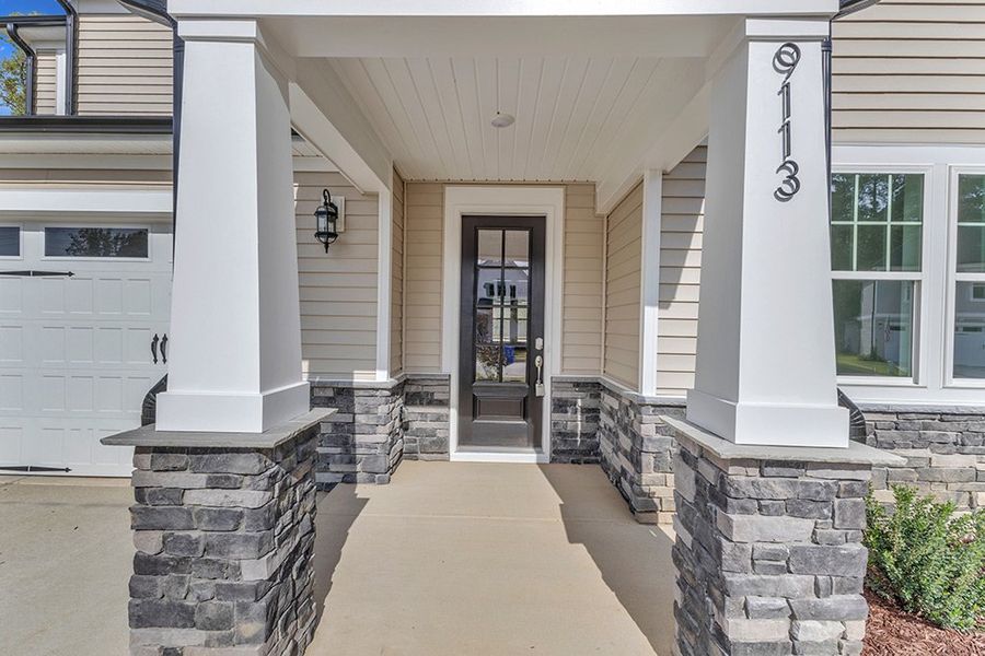 Representative exterior details of a home built from the The Hampton by RobuckHomes in Kennebec Crossing, Angier (Image 56). Representative exterior details of a home built from the The Hampton by RobuckHomes in Kennebec Crossing, Angier (Image 56).