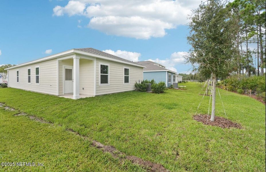 Exterior details and patio area of a home in , Palm Coast (Image 3). Exterior details and patio area of a home in , Palm Coast (Image 3).