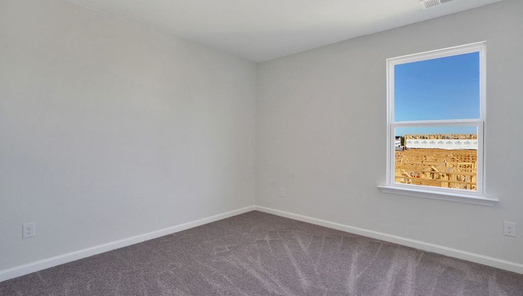 Representative unfurnished interior of a home built from the ROBIE by D.R. Horton in The Pines at Blake Farm, Wilmington (Image 22).