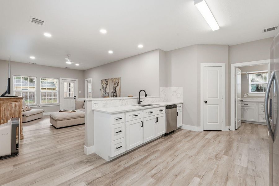 Furnished interior view inside a new home in , Conroe (Image 9).